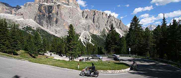 Motorcycle adventures: Motorcycle tour on the winding road to Sella pass, Dolomites 2