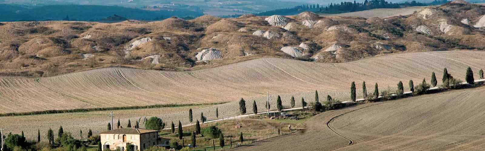 A motorcycle ride in the singular Crete of Siena, Tuscany