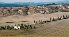 A motorcycle ride in the singular Crete of Siena, Tuscany